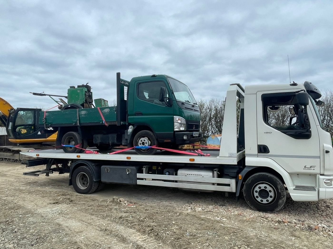 Car secured on a Z&Z recovery truck for transport