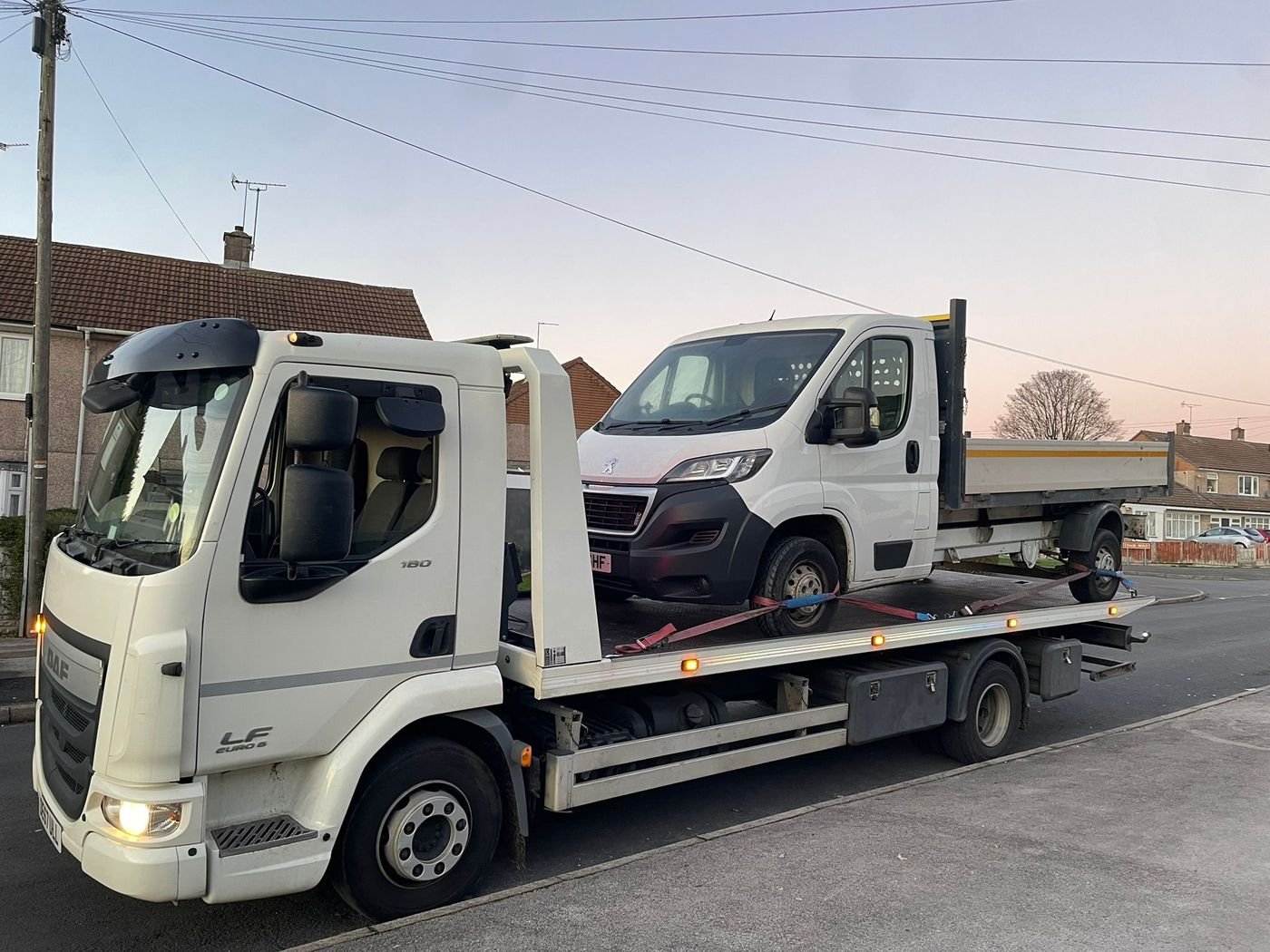 Z&Z Auto Recovery loading a vehicle from the M6